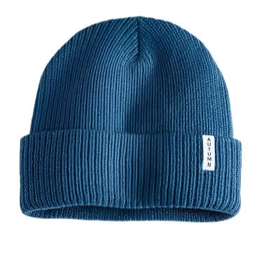 Autumn Junior's Basic Beanie 2025 - A blue beanie with a folded cuff and a small white tag on the front.