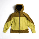 Front view of color-block hooded shell jacket with full-length zip
