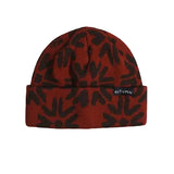 Autumn Craft Beanie in rust red with a black leaf pattern and folded cuff