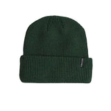 Dark green rib-knit beanie with a wide folded cuff and small side label
