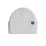 White ribbed knit beanie with a folded cuff and small logo tag