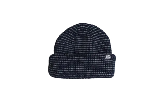 Midnight striped double-roll beanie with a folded cuff and small logo tag