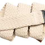 Arcade Futureweave Belt 2025 - A cream-colored belt with a woven pattern and a black buckle.