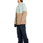 Volcom 2L GORE-TEX Shell Jacket - A tan and light green jacket with a hood, zipper closure, and two chest pockets.