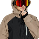 Volcom Men's Dua Insulated GORE-TEX Jacket - A black jacket with a hood, featuring tan sleeves and a tan zipper pull.