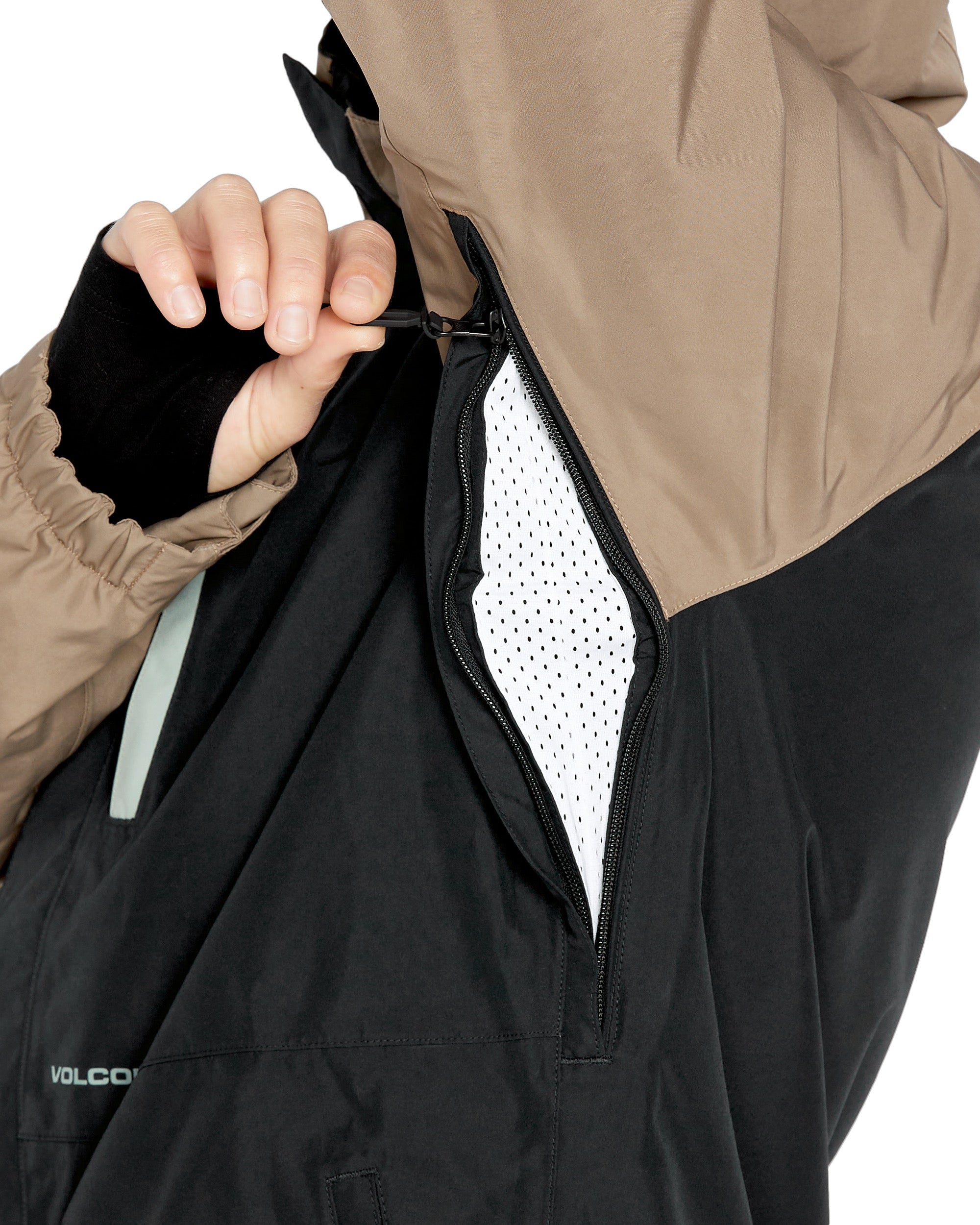 Volcom Men's Dua Insulated GORE-TEX Jacket - A black jacket with a tan hood and chest area, featuring a zipper closure.