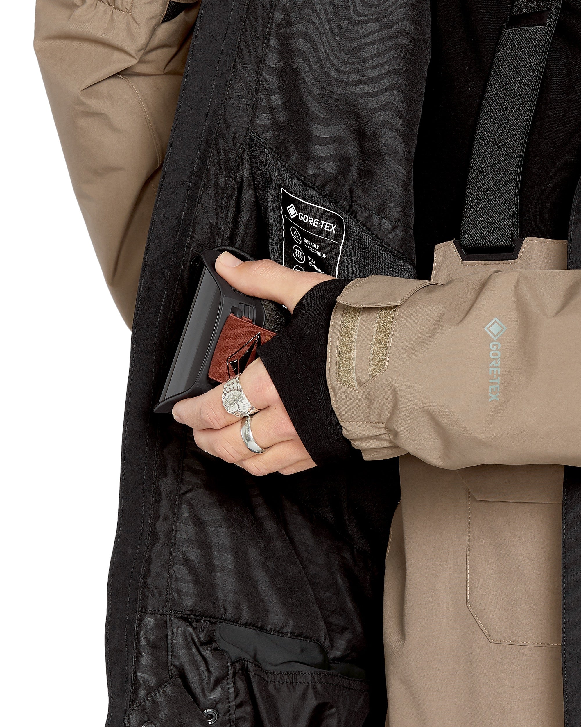 Volcom Men's Dua Insulated GORE-TEX Jacket - A black insulated jacket with a white logo on the left chest and a zipper closure.