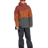Volcom Primary Insulated Jacket - A red, orange, and gray jacket with a hood, zippered pockets, and a logo on the left chest.