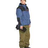 Volcom Longo GORE-TEX Jacket - A blue jacket with black accents and a hood, featuring two zippered pockets on the front.