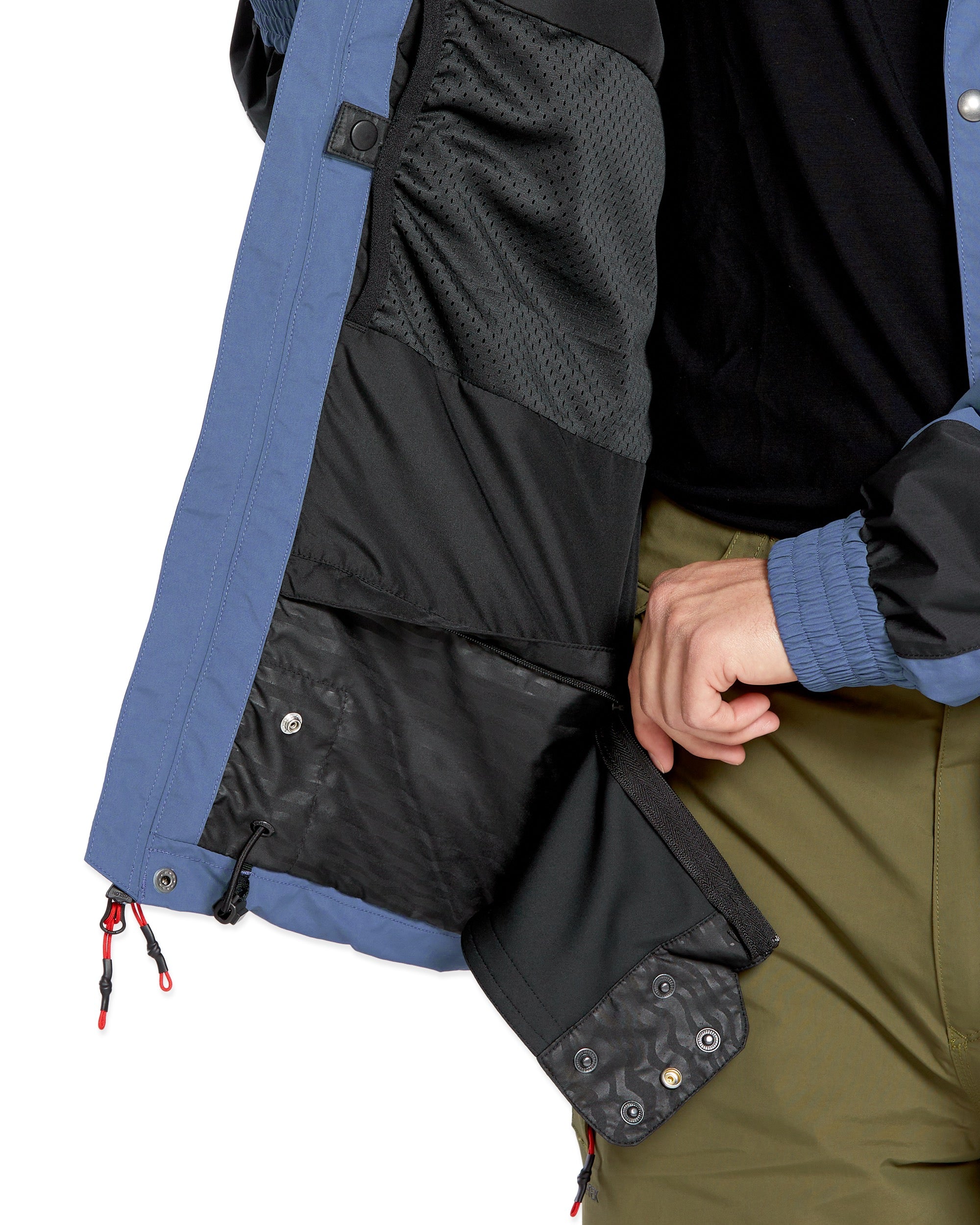 Volcom Longo GORE-TEX Jacket - A black jacket with a blue stripe down the side and a hood, featuring a zippered chest pocket on the right side.