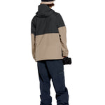 Volcom 2L Insulated GORE-TEX Jacket - A tan and black jacket with a hood, featuring two zippered pockets on the front.