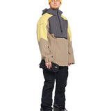 Volcom - A tan jacket with a darker brown patch on the chest, featuring a hood and zip closure.