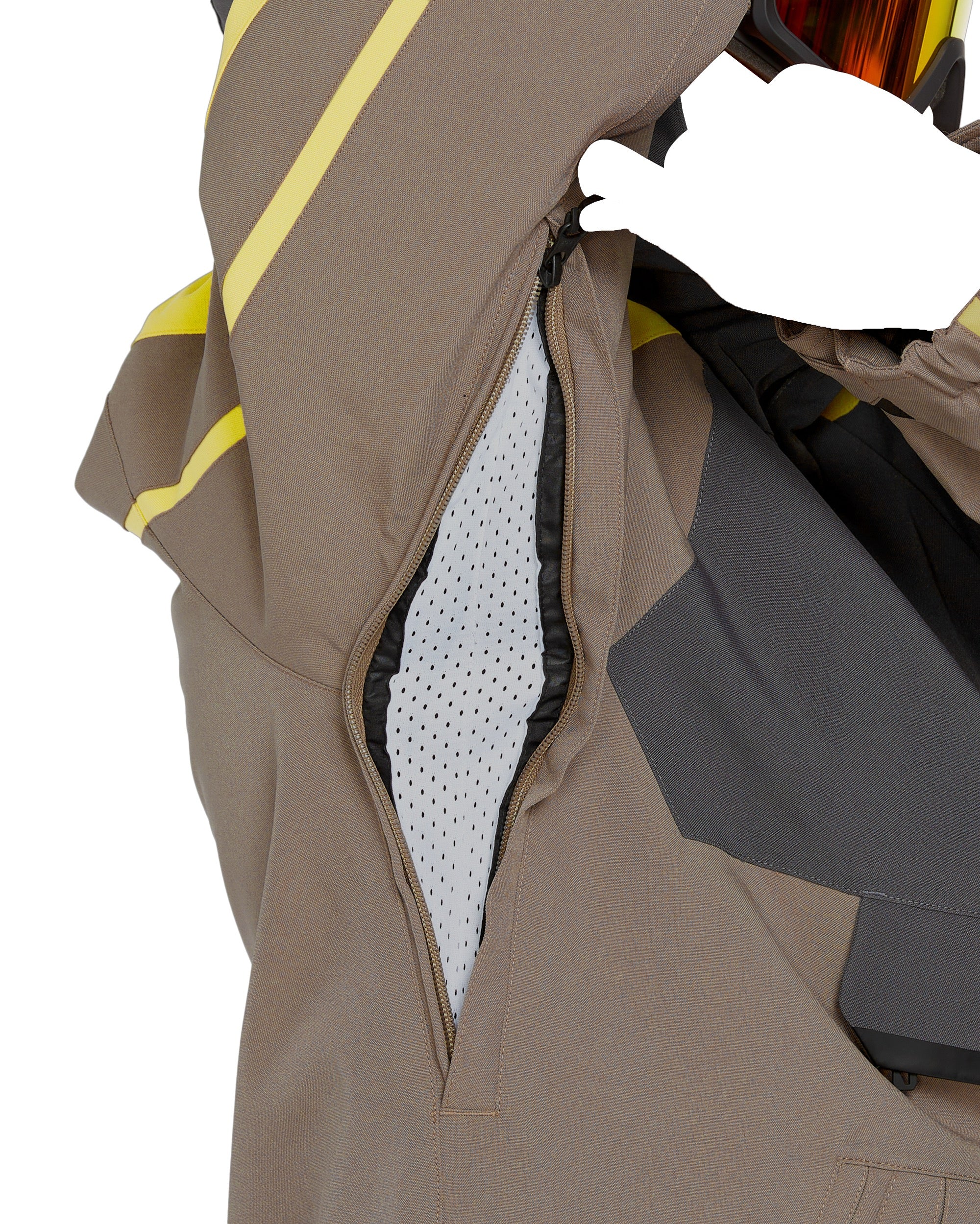 Volcom Brighton Pullover Jacket 2025 - A tan-colored jacket with yellow stripes on the sleeves and a zipper down the front.