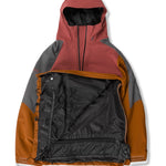 Volcom Brighton Pullover Jacket 2025 - A red, gray, and orange jacket with a hood, featuring a zipper down the front.