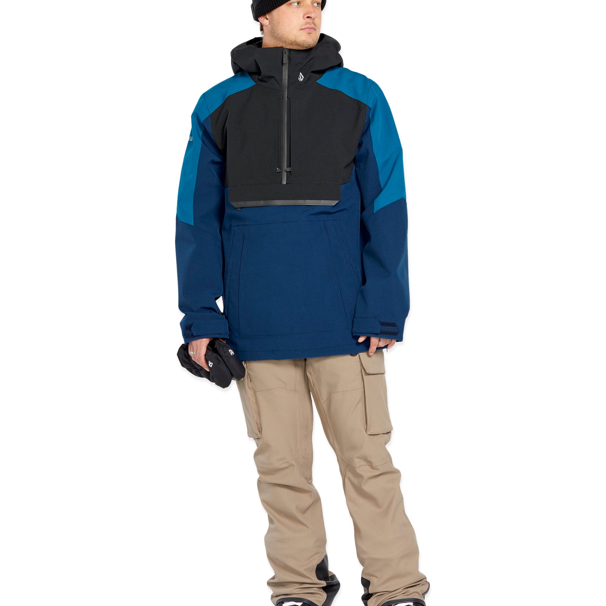 Volcom Brighton Pullover Jacket - A navy blue jacket with a black chest pocket and white logo on the left sleeve.