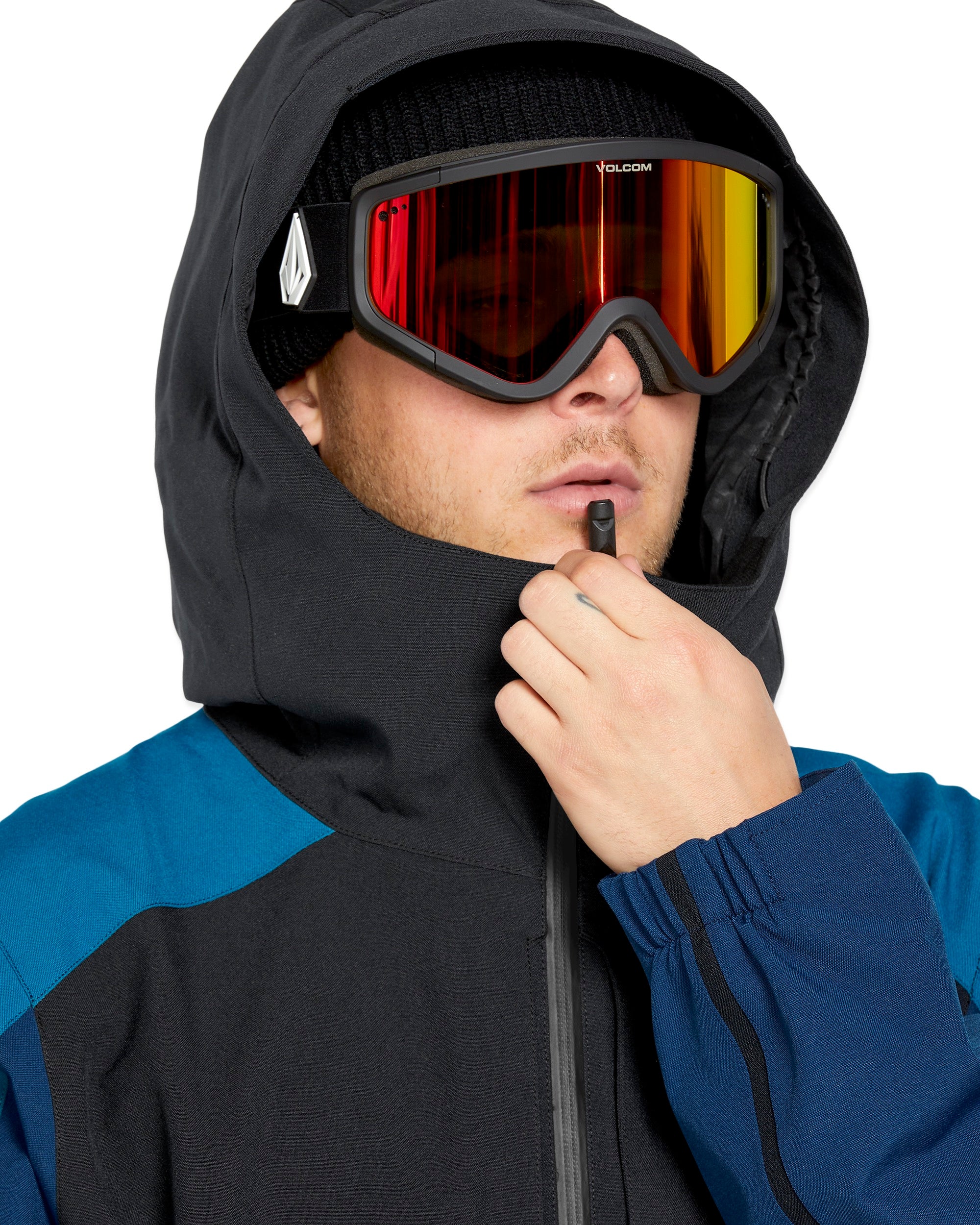 Volcom Brighton Pullover Jacket 2025 - A black jacket with a blue stripe on the shoulder and chest area.