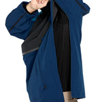 Volcom Brighton Pullover Jacket - A navy blue jacket with a hood, featuring a zipper closure and two zippered pockets on the front.