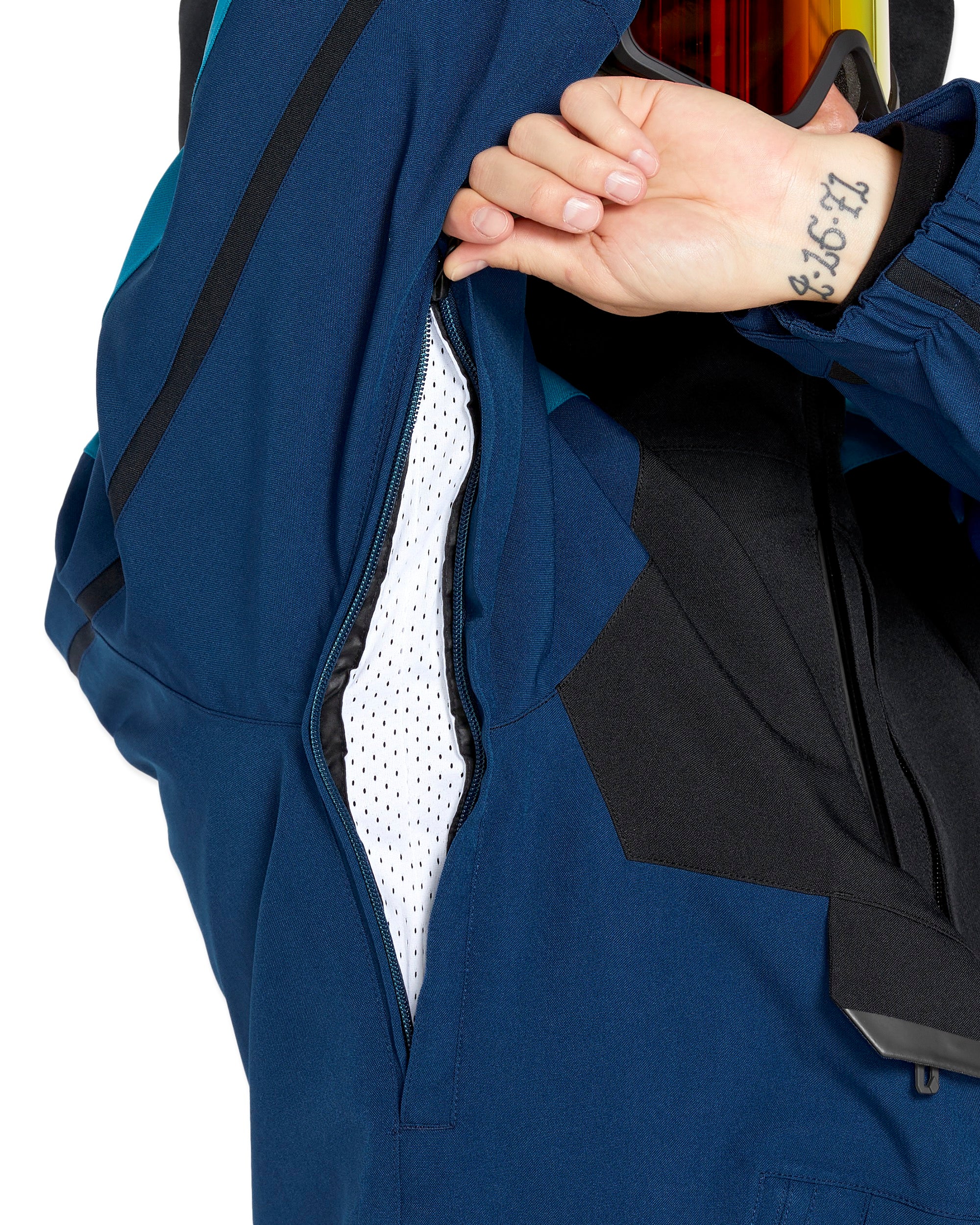 Volcom Brighton Pullover Jacket - A navy blue jacket with a black zipper and two zippered pockets on the front.