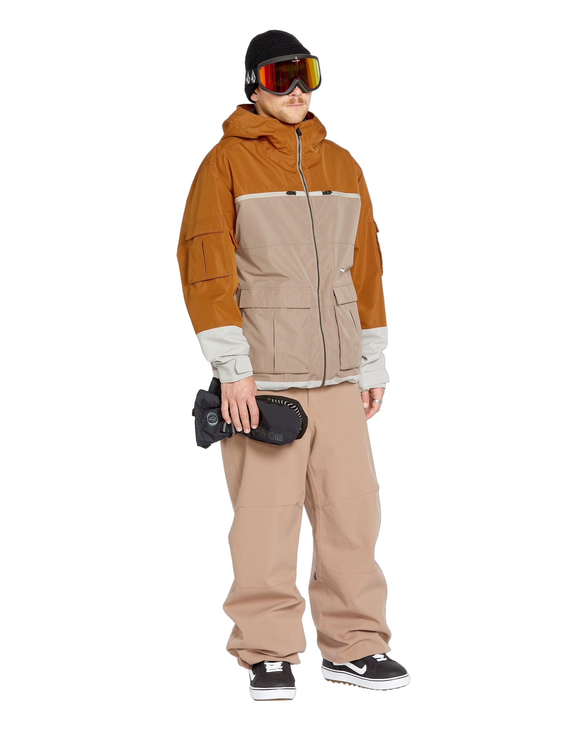 Volcom Nightbreaker 20K Jacket - A tan jacket with a white stripe across the chest and two zippered pockets on either side of the waist.