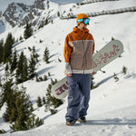 Volcom Nightbreaker 20K Jacket 2025 - A tan jacket with a white stripe across the chest and two zippered pockets on either side of the waist.