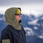 Volcom V.CO WFO Shell Jacket 2025 - A dark blue jacket with a hood, featuring a black zipper and a small logo on the left chest.