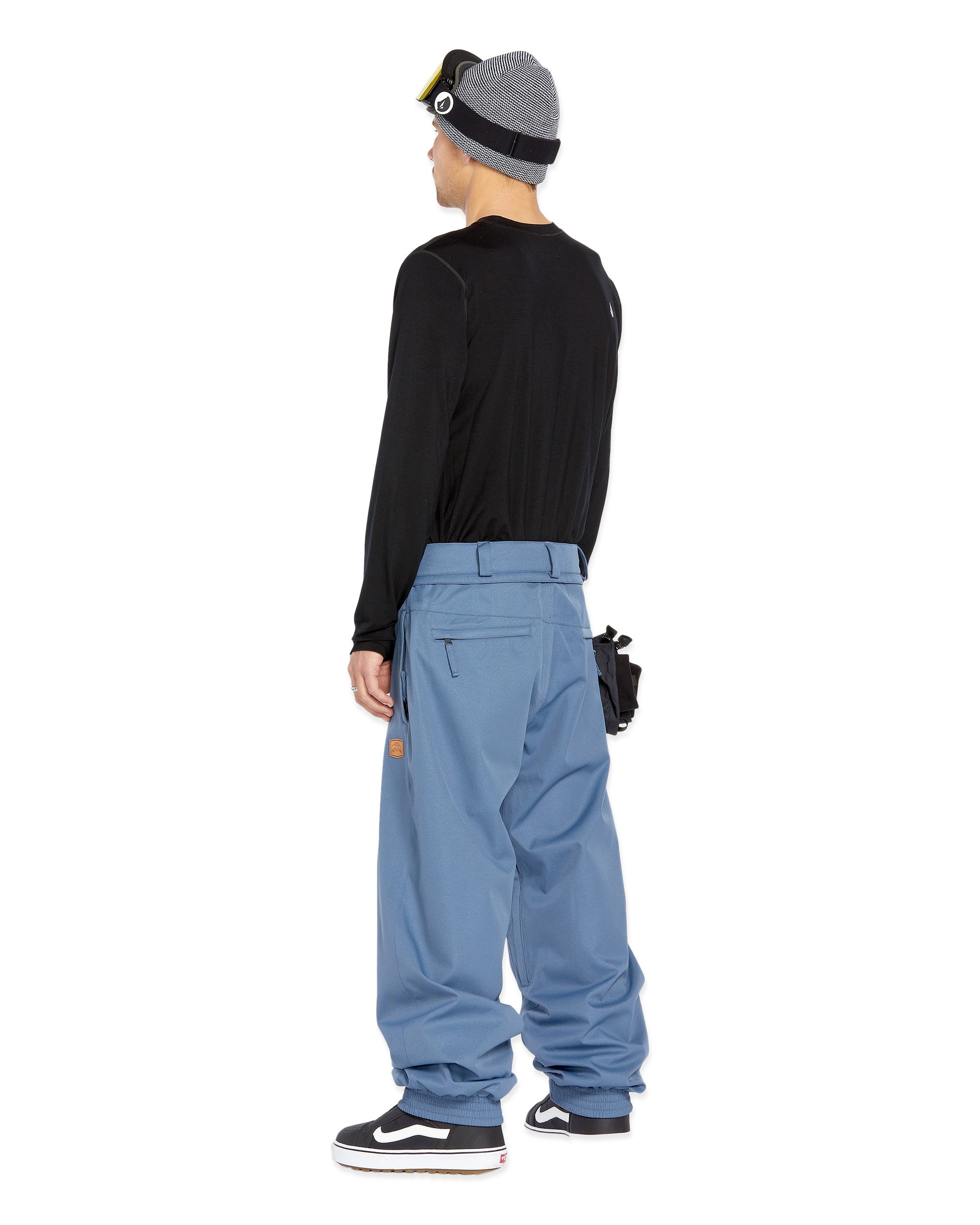 Volcom Longo 20K Pullover Jacket - A black jacket with a yellow zipper and white logo on the chest.