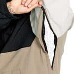 Volcom Brighton FZ Shell Jacket - A tan-colored jacket with a black zipper and two zippered pockets on the front.
