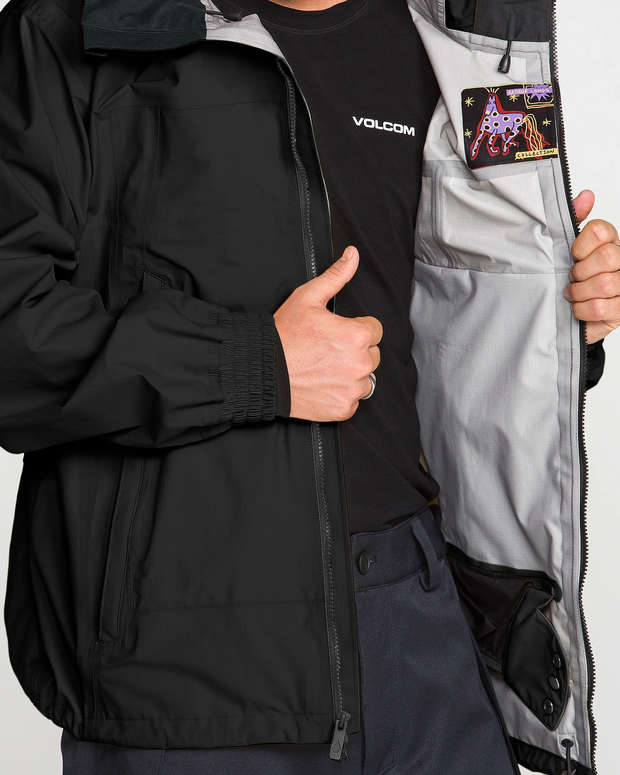 Volcom Arthur 3L 20K jacket close-up with VOLCOM chest logo and open front