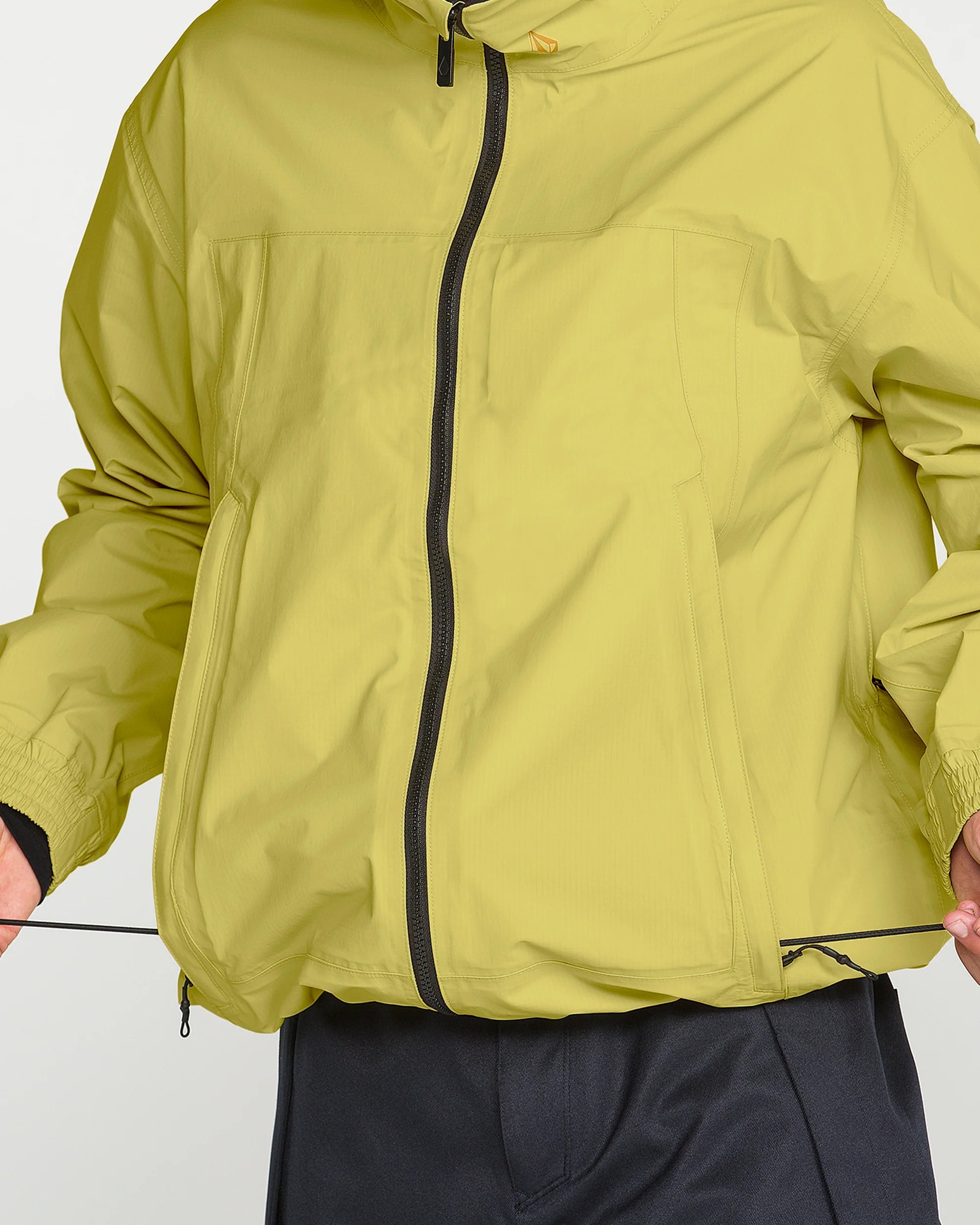 Yellow 3L 20K ski jacket close-up with center zip and wind flap