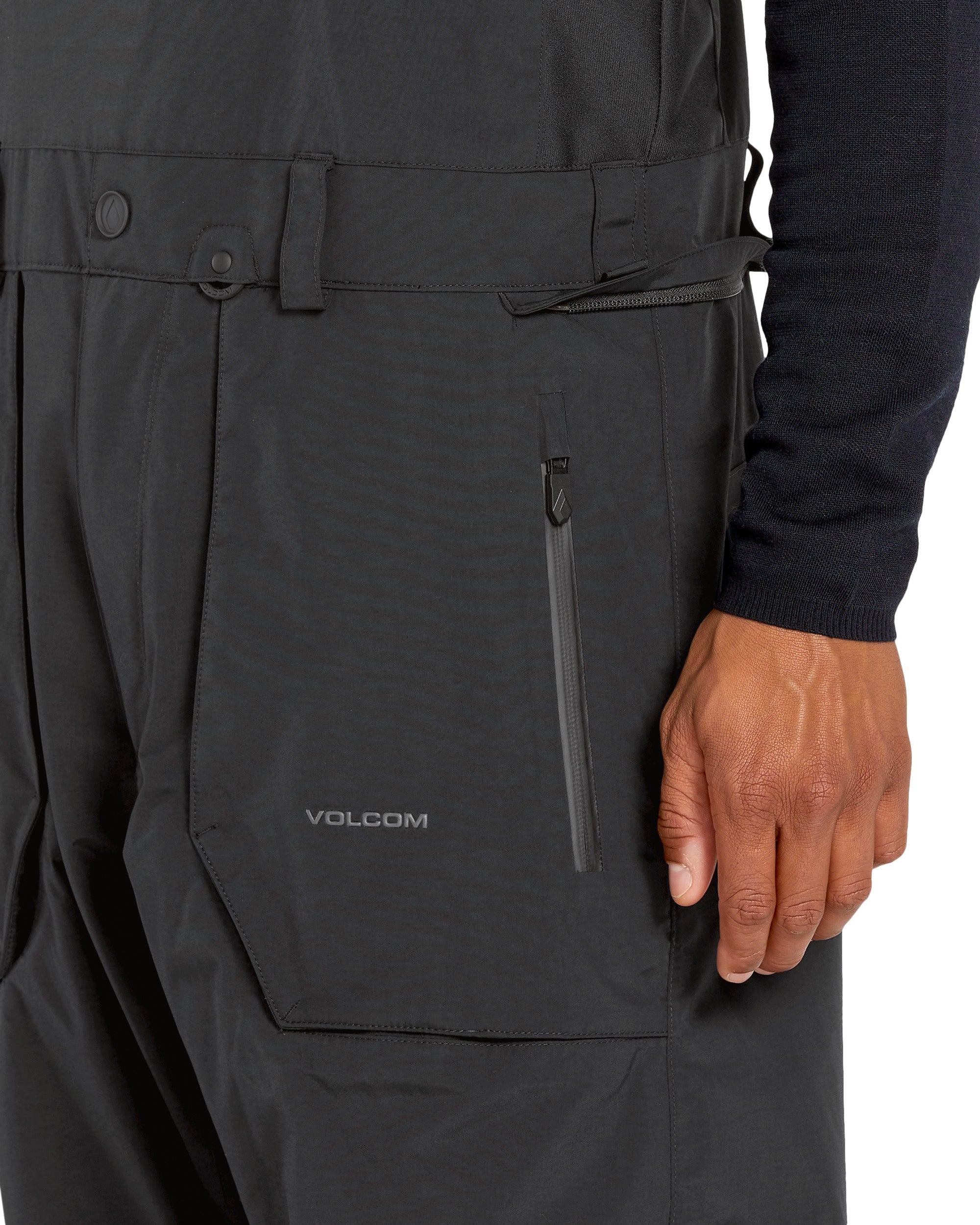 Volcom Men's Rain GORE-TEX Bib Overall - A pair of black waterproof overalls with a zippered fly and adjustable straps.