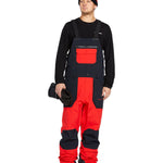 Volcom Men's Rain GORE-TEX Bib Overall - Black bib overalls with red accents and a black zipper on the front.