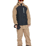 Volcom Men's Rain GORE-TEX Bib Overall - A black bib overall with a tan rain jacket and matching pants, featuring a hood on the jacket.