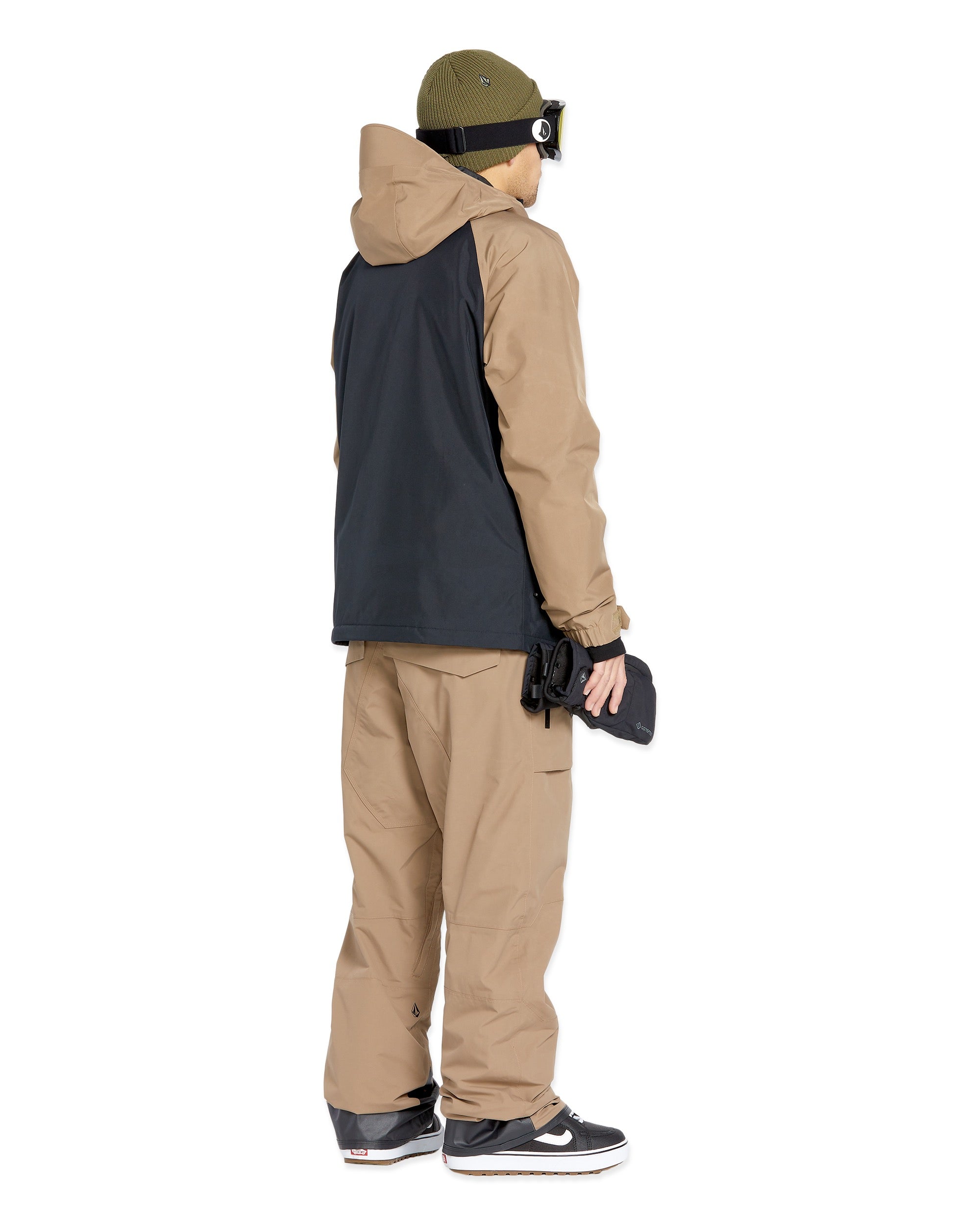 Volcom Men's Rain GORE-TEX Bib Overall - A black bib overall with a tan rain jacket and matching pants, featuring a hood on the jacket.
