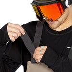 Volcom Men's Rain GORE-TEX Bib Overall - A pair of khaki-colored bib overalls with a black zipper and adjustable straps.