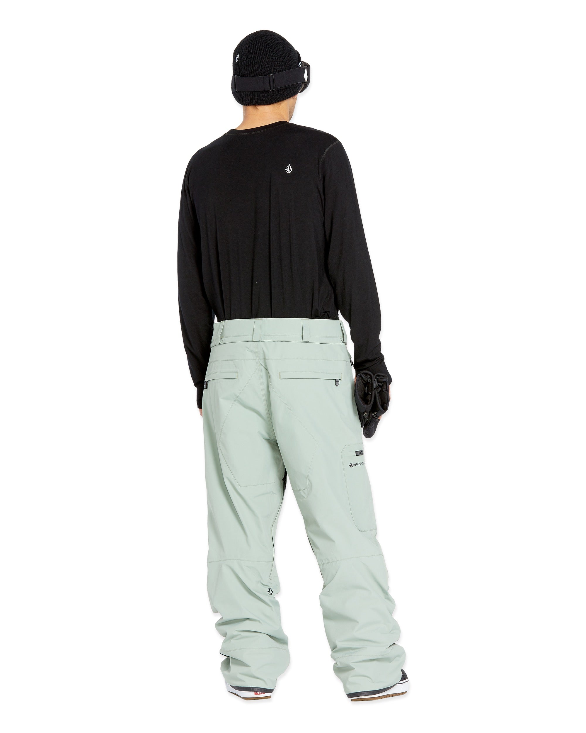 Volcom Men's L GORE-TEX Shell Pant 2025 - A black pair of snow pants with a white logo on the left thigh and a zippered pocket on the right leg.