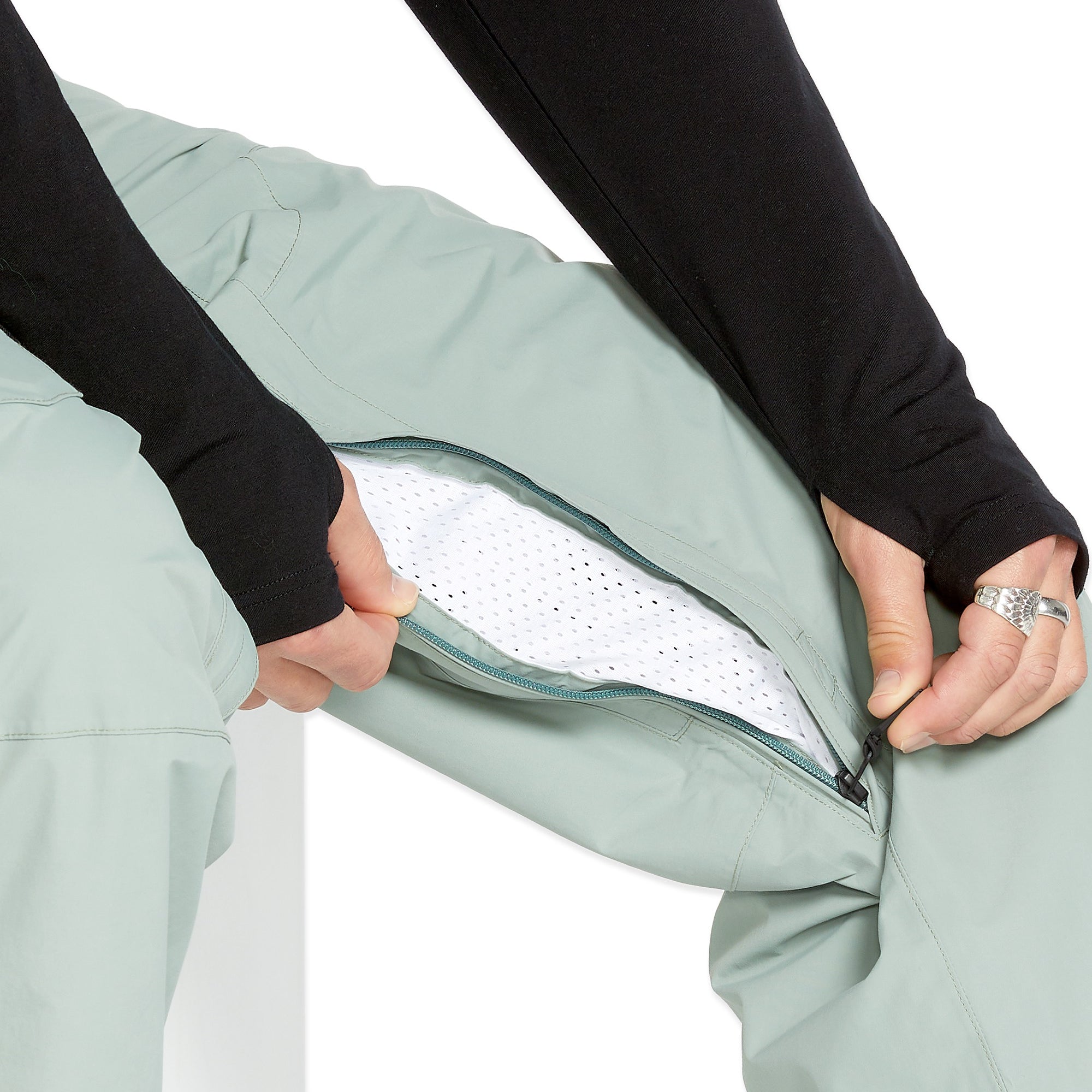 Volcom Men's L GORE-TEX Shell Pant - A pair of light green snow pants with a zippered fly and two front pockets.