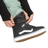 Volcom Men's L GORE-TEX Shell Pant - A pair of black pants with a white logo on the left leg, featuring a zippered fly and adjustable cuffs.