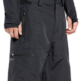 Volcom Men's L GORE-TEX Shell Pant - Black pants with a zippered pocket on the thigh and a logo patch on the left leg.
