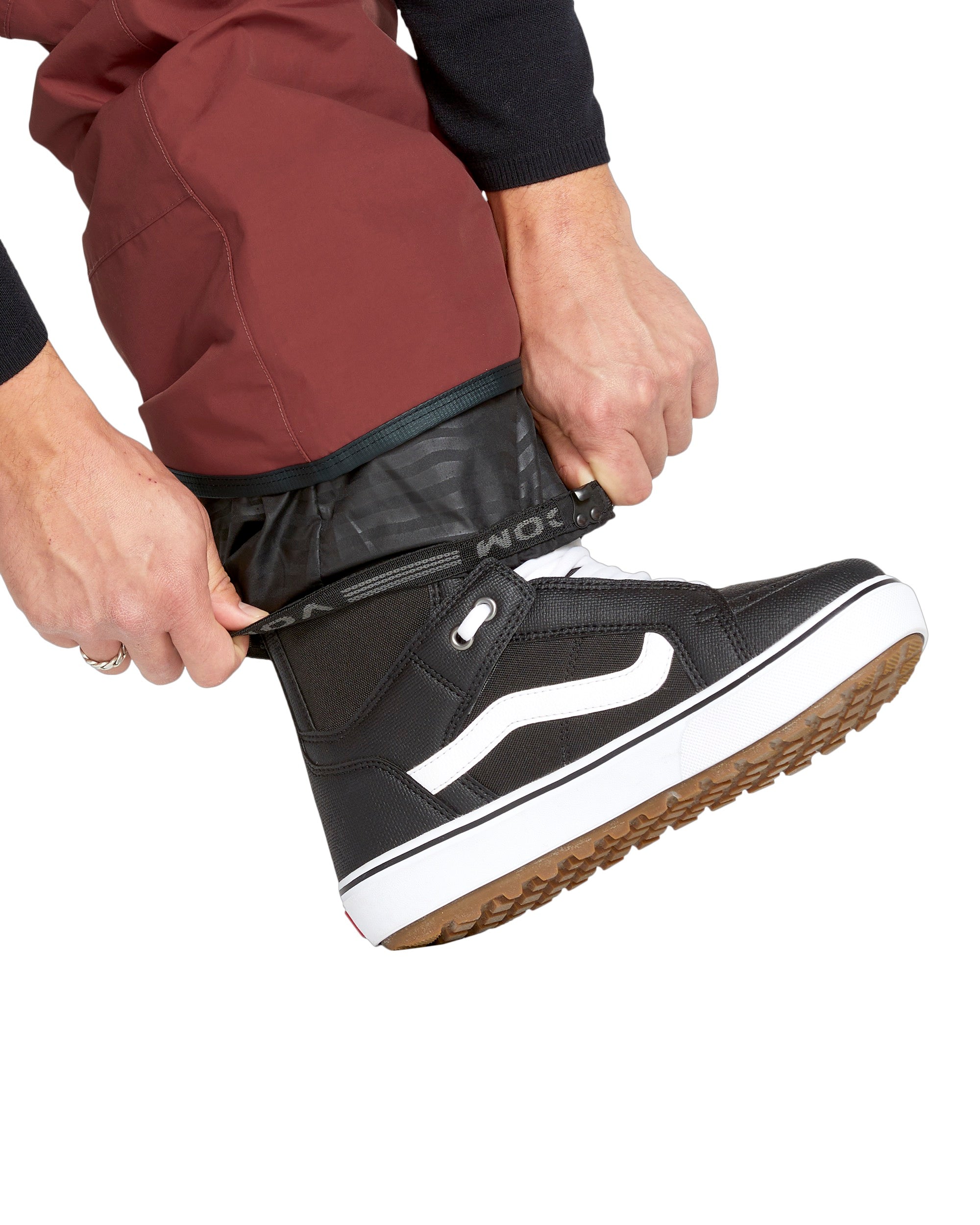 Volcom Men's L GORE-TEX Shell Pant - A pair of black snow pants with a white logo on the left leg.