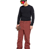 Volcom Men's L GORE-TEX Shell Pant 2025 - A pair of red snow pants with a black zipper on the left leg.