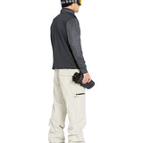 Volcom Men's L GORE-TEX Shell Pant 2025 - A black and grey snowboard pant with a wavy line pattern on the upper leg, featuring a zippered pocket at the thigh.