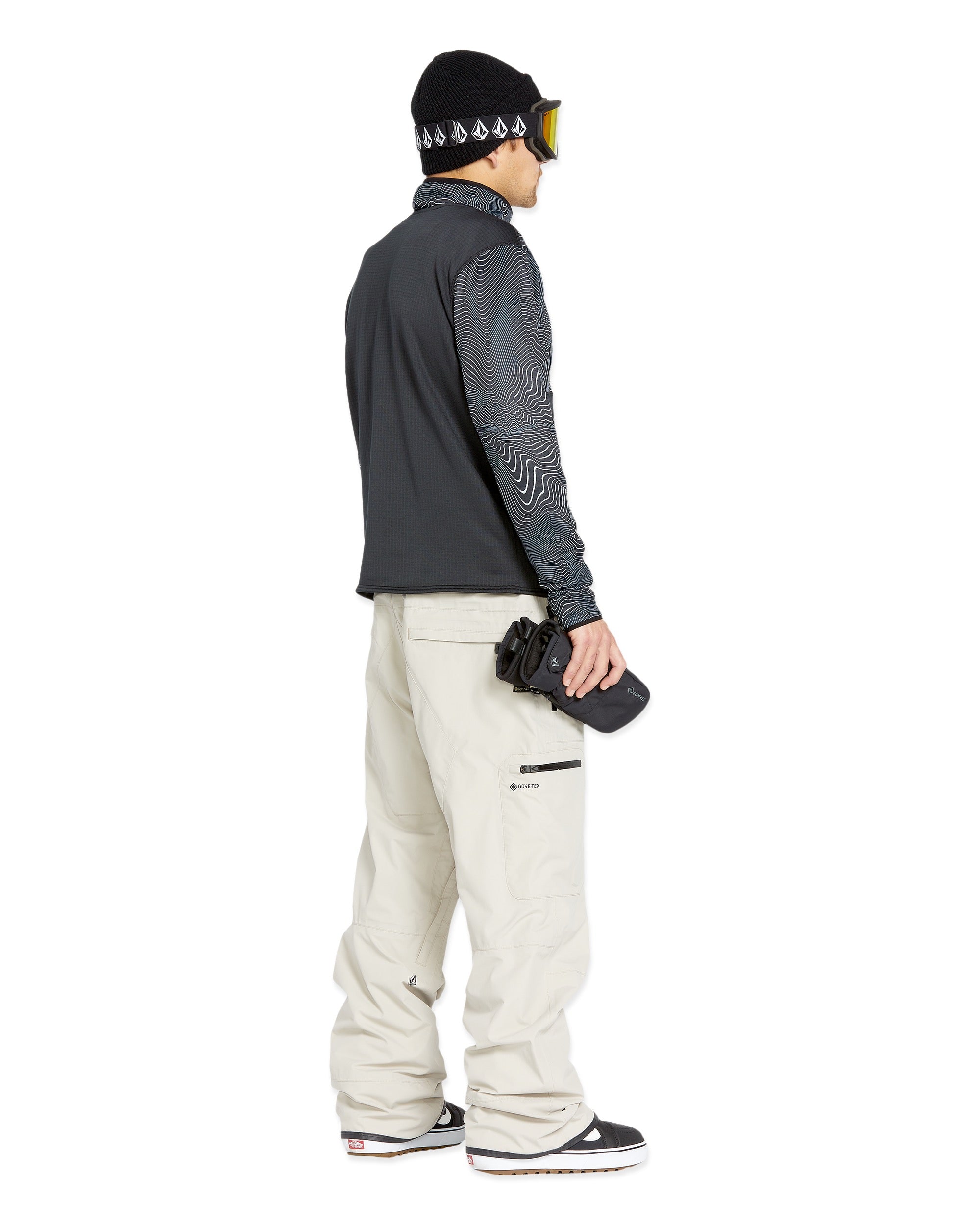 Volcom Men's L GORE-TEX Shell Pant 2025 - A black and grey snowboard pant with a wavy line pattern on the upper leg, featuring a zippered pocket at the thigh.