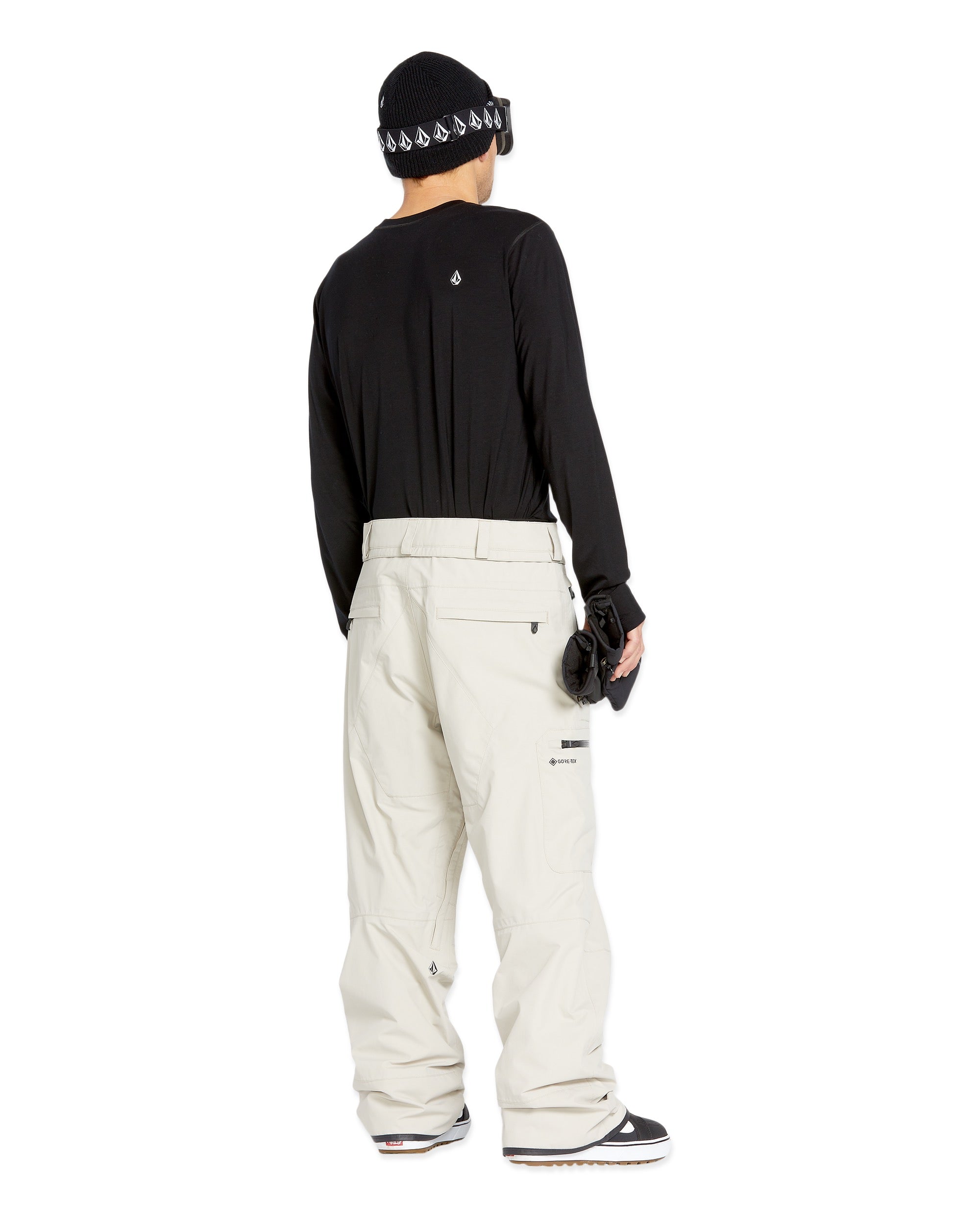 Volcom Men's L GORE-TEX Shell Pant 2025 - A black pair of snow pants with a white logo on the left thigh and a zippered pocket on the right leg.