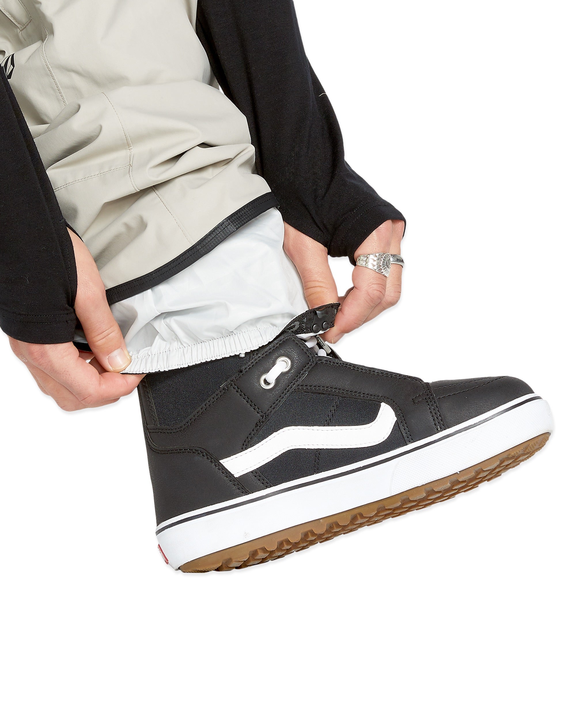 Volcom Men's L GORE-TEX Shell Pant - A pair of khaki-colored pants with a black waistband and zipper fly.