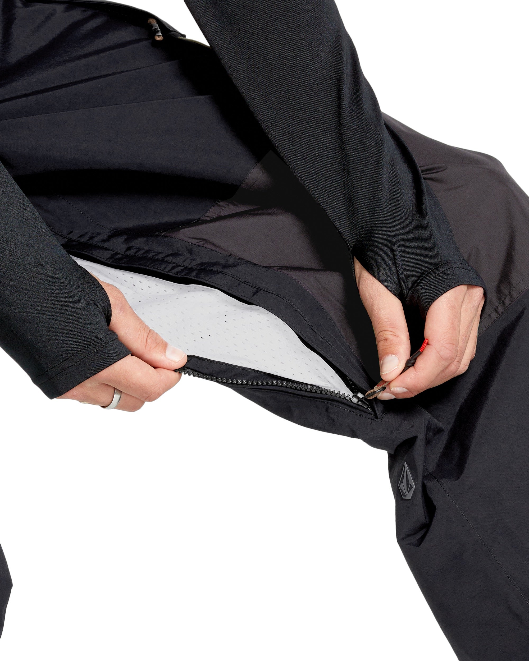 Volcom Men's Longo GORE-TEX Shell Pants - Black pants with a zippered pocket on the thigh and a black zipper pull.