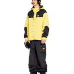 Volcom Men's Longo GORE-TEX Shell Pants - A pair of black snow pants with a brown logo patch on the left thigh.