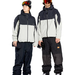Volcom Men's Longo GORE-TEX Shell Pants - Black pants with a white logo on the left thigh and black zippers on the side pockets.