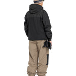 Volcom Men's Longo GORE-TEX Shell Pants - Black shell pants with a zippered pocket on the thigh and adjustable cuffs at the ankles.