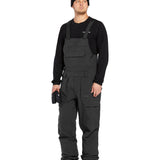 Volcom Men's Roan Shell Bib Overall - A black bib overall with a zippered fly and adjustable straps.