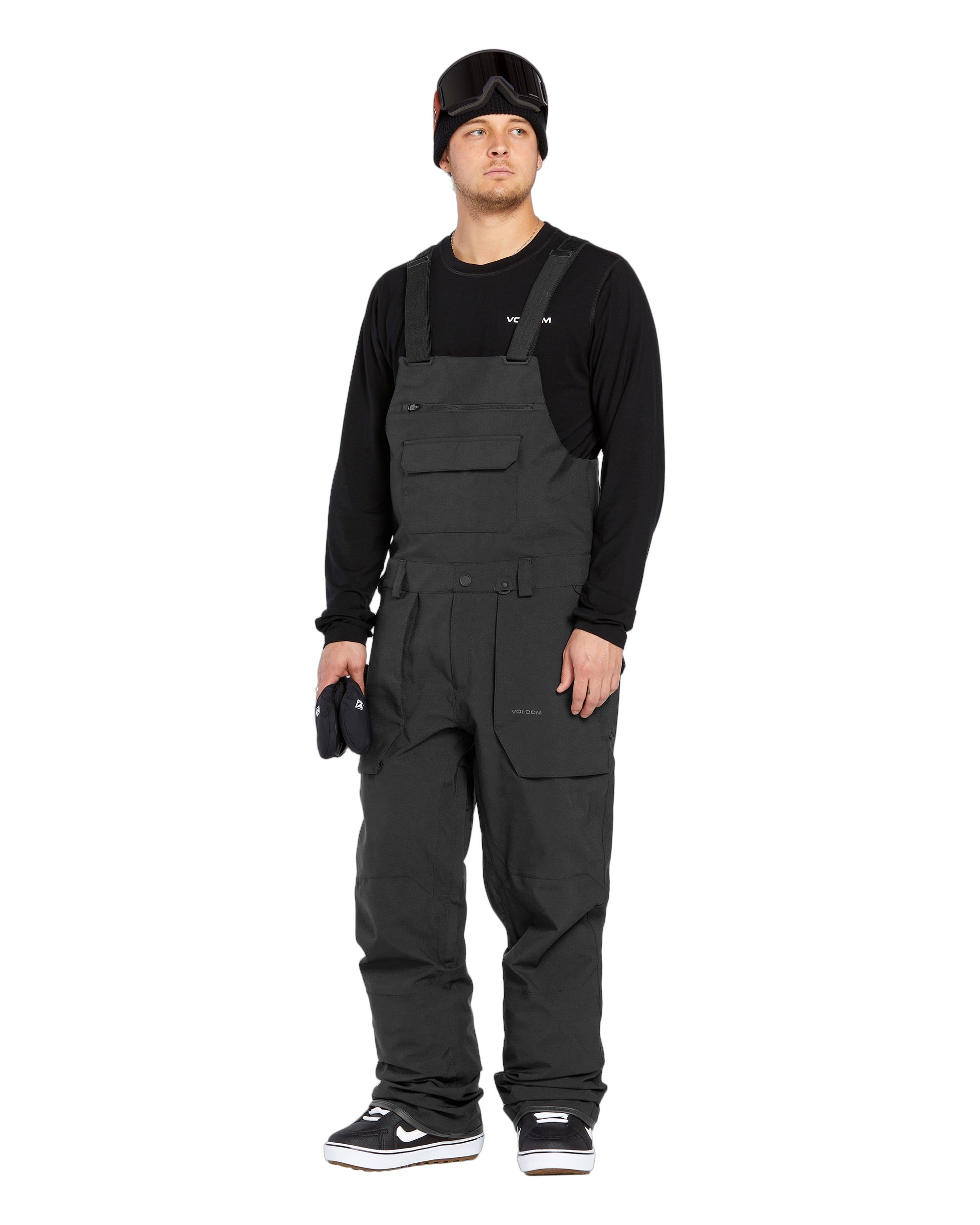 Volcom Men's Roan Shell Bib Overall - A black bib overall with a zippered fly and adjustable straps.